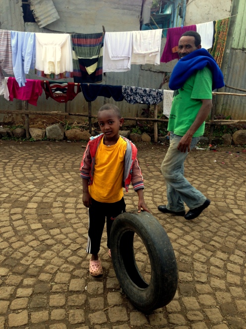 boy with tire